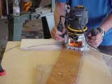 Del making an incremental cut in the rocker box sides with the
router.