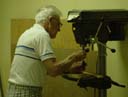 Grandpa making feet for
baseboard.